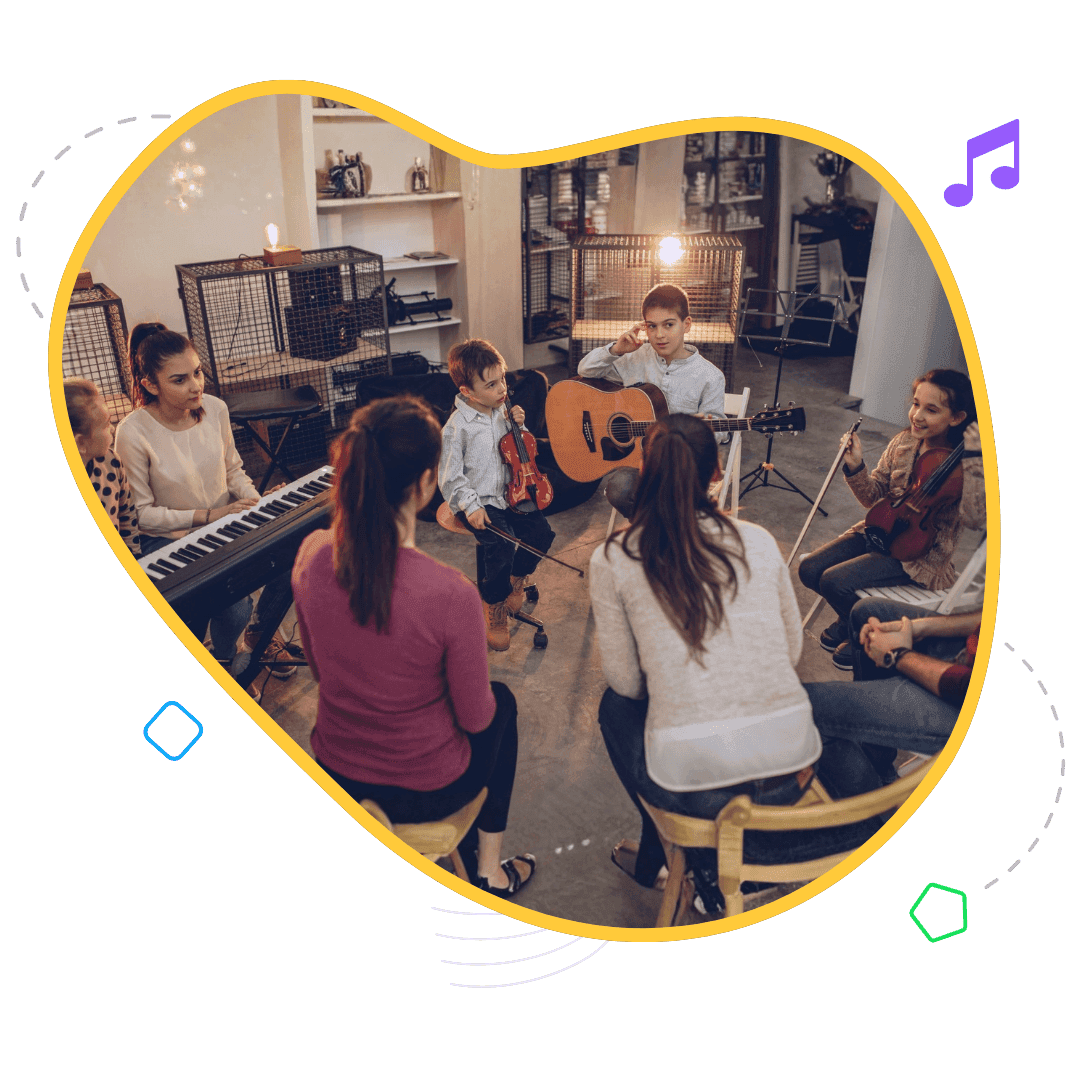 Children making music together at a school-holiday camp